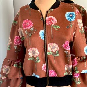 SWEATSHIRT ZIP UP WITH RUFFLE ACCENT ON SLEEVE. SIZE SMALL